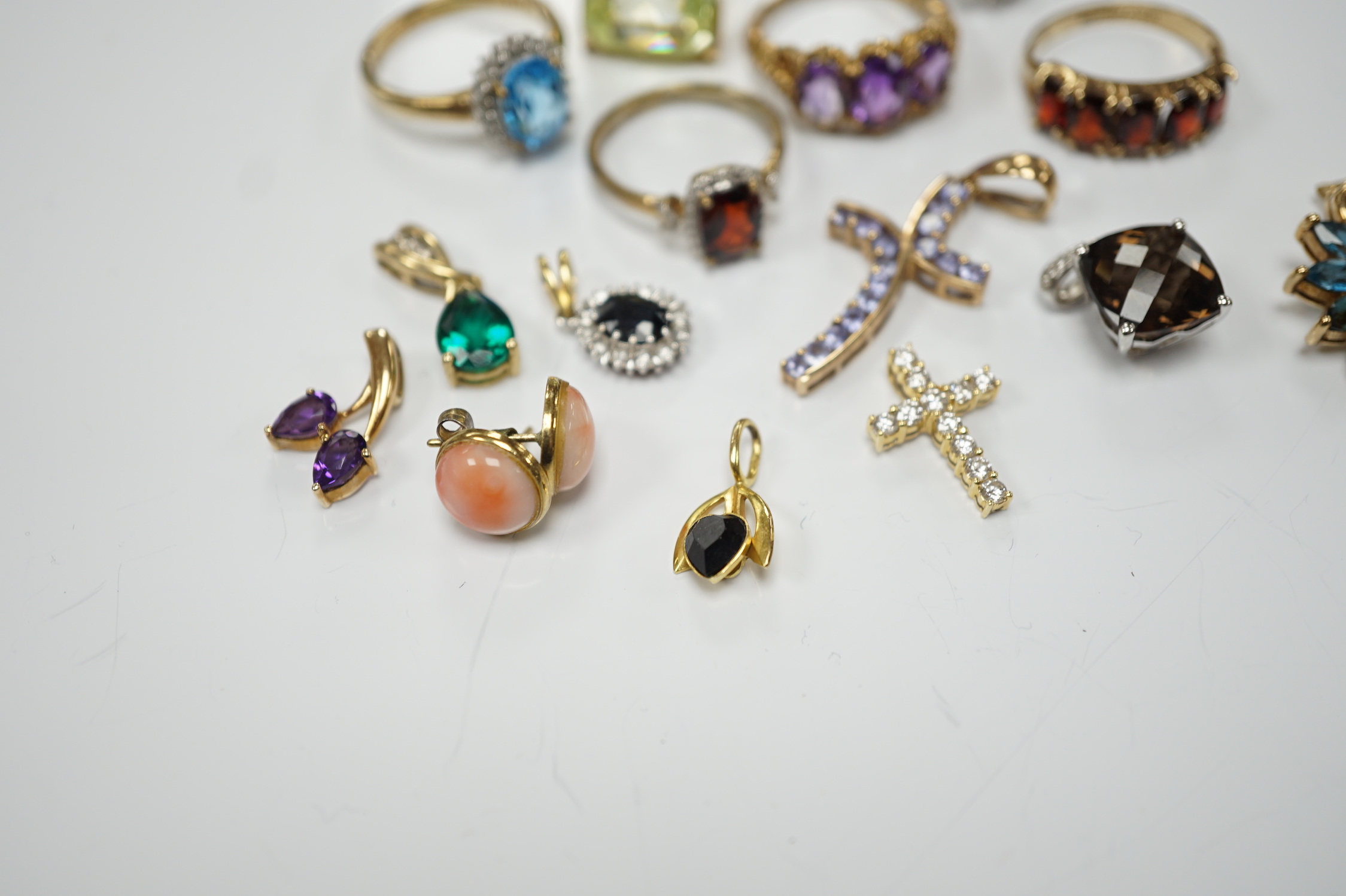 Five assorted modern 9ct gold and gem set rings, including garnet and amethyst, one other yellow metal and gem set ring, six assorted modern 9ct gold and gem set pendants, two other pendants including diamond set cross a